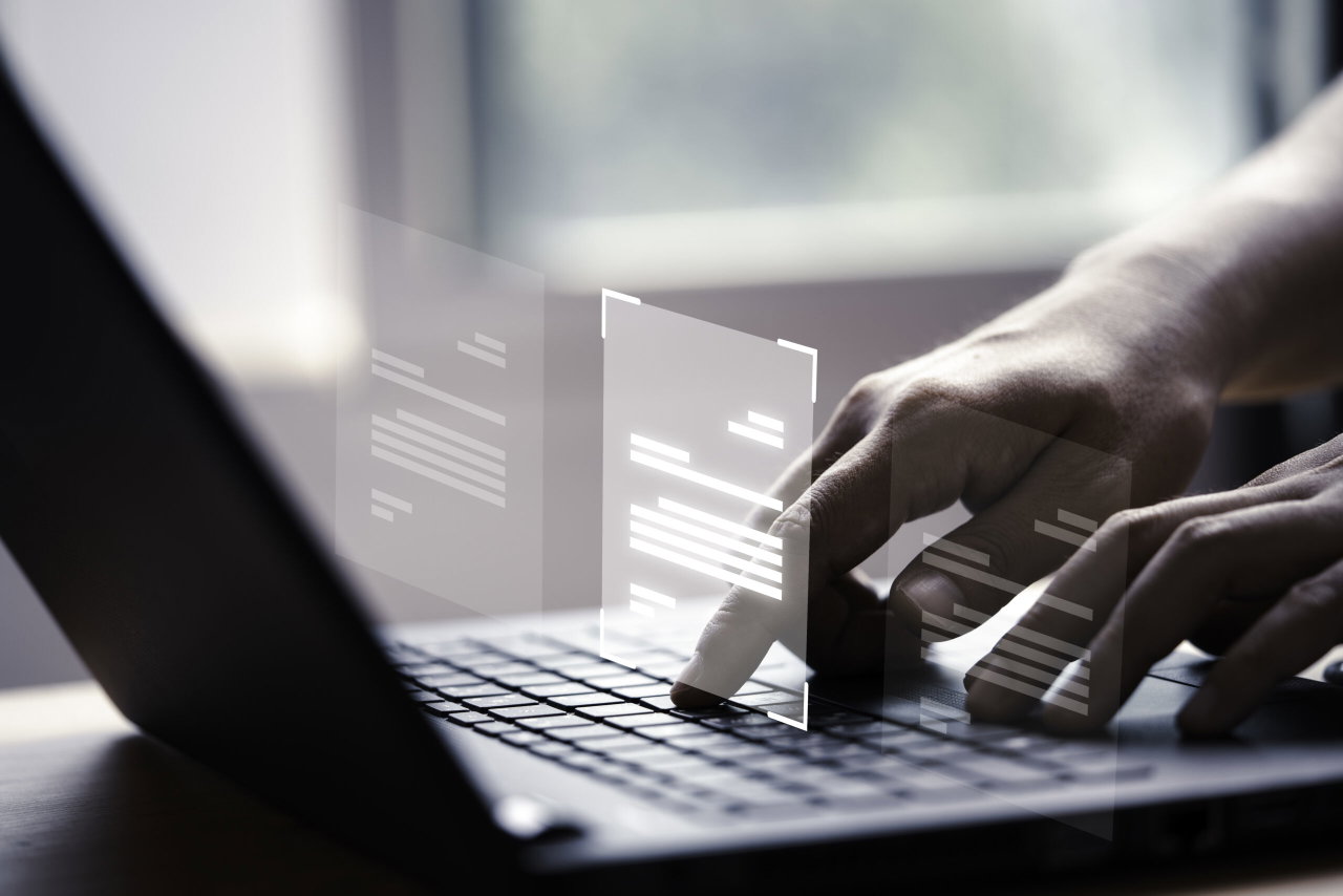 Image of someone using the laptop with digital board - Destination Certification