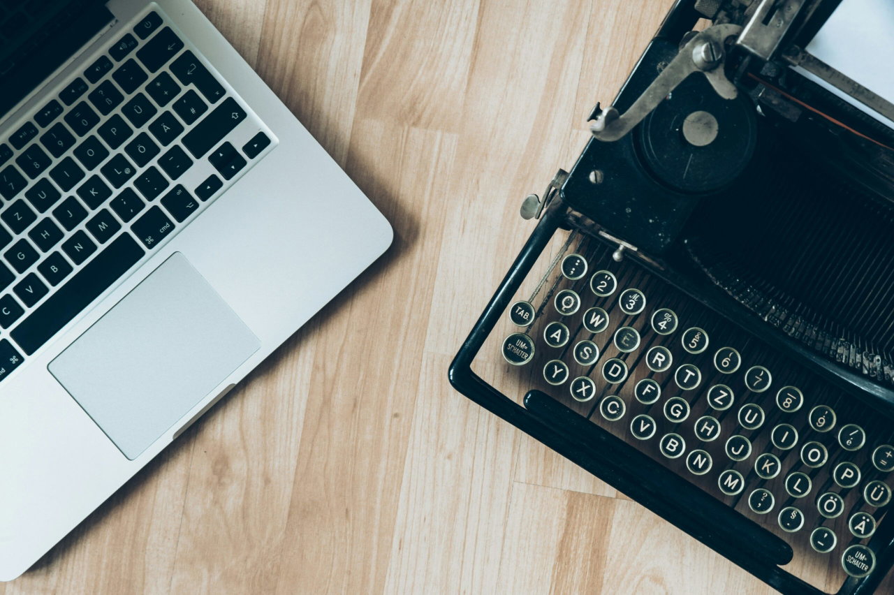 Image of laptop and typewriter - Destination Certification