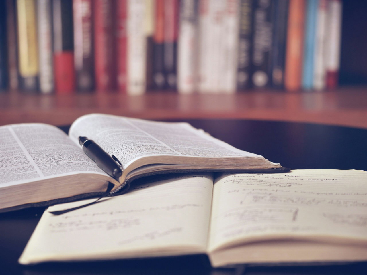 Image of books on a table - Destination Certification